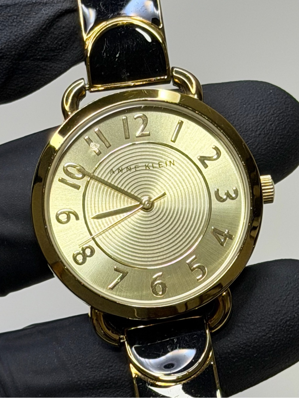 Anne Klein Round Enamel AK/1606BKGB Gold-Tone SS Bangle 32mm Ladies’ Watch